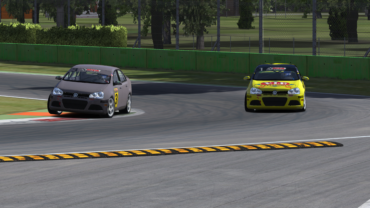 Completing the pass for the lead on turn 1 of the final lap