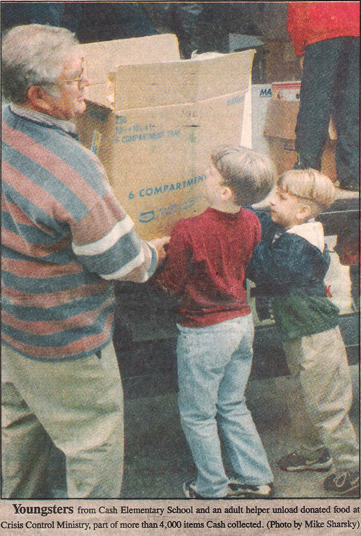 A blurb about our field trip to the local food pantry, from the Kernersville News on November 29, 1997. That’s me in the middle.