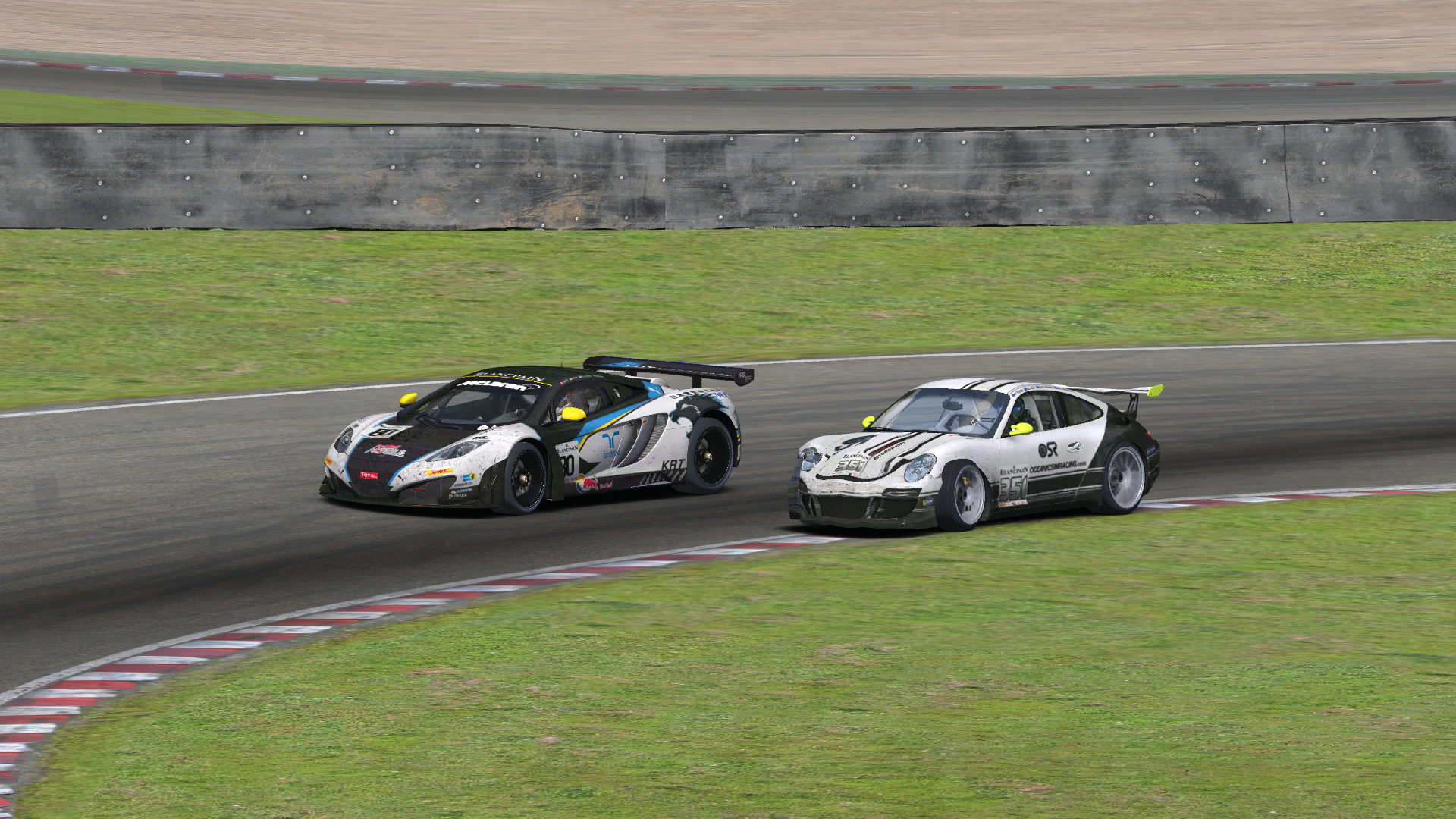 Making an outside pass in turn 3 at Brands Hatch.